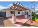 Brick patio with pergola and grassy backyard at 2130 E San Juan Ave, Phoenix, AZ 85016