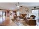 Bright and airy living room with vaulted ceilings, fireplace, and large windows at 2131 W Ironwood Dr, Chandler, AZ 85224