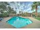 Relaxing pool area with spacious deck and tranquil water at 2131 W Ironwood Dr, Chandler, AZ 85224