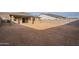 Large backyard with view of home and mountain at 21411 W Meadowbrook Ave, Buckeye, AZ 85396