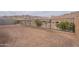 Backyard with block wall and metal fence, mountain view at 21418 W Meadowbrook Ave, Buckeye, AZ 85396