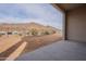 Backyard with mountain views and concrete patio at 21418 W Meadowbrook Ave, Buckeye, AZ 85396