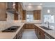 Modern kitchen with an abundance of cabinetry and a large island at 21418 W Meadowbrook Ave, Buckeye, AZ 85396