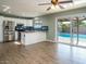 Spacious kitchen with pool view and breakfast bar at 2215 E Des Moines Cir, Mesa, AZ 85213