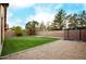 Artificial turf backyard with storage shed and block wall at 2304 S Abbey --, Mesa, AZ 85209