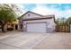 One story house with a two car garage and desert landscaping at 2304 S Abbey --, Mesa, AZ 85209