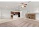 Kitchen with an island and dark wood cabinets at 2304 S Abbey --, Mesa, AZ 85209