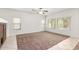 Living room with carpet, tile, and ceiling fan at 2304 S Abbey --, Mesa, AZ 85209