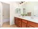 Double vanity bathroom with a soaking tub and separate shower at 2410 W Aloe Vera Dr, Phoenix, AZ 85085