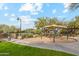 Community playground with shaded seating and play equipment at 2410 W Aloe Vera Dr, Phoenix, AZ 85085