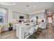 Modern kitchen with island, stainless steel appliances, and ample counter space at 24111 W Flores Dr, Buckeye, AZ 85326