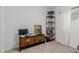 Bedroom with built-in shelving and a home office setup at 2528 W Brookhart Way, Phoenix, AZ 85085