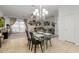 Bright dining area with glass table and chairs, adjacent to the kitchen at 2528 W Brookhart Way, Phoenix, AZ 85085