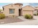 Two-story house with a two-car garage and nicely landscaped front yard at 2528 W Brookhart Way, Phoenix, AZ 85085