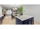 Kitchen island with white countertop and navy blue cabinetry at 2528 W Brookhart Way, Phoenix, AZ 85085