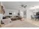 Open living room and dining area with modern furnishings and ample natural light at 2528 W Brookhart Way, Phoenix, AZ 85085