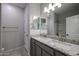 Double vanity bathroom with granite countertops at 2575 E Bluff Spring Ave, Apache Junction, AZ 85119