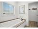 Bathroom with soaking tub and linen closet at 2693 S 357Th Dr, Tonopah, AZ 85354