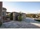 Landscaped backyard with stone pathway at 27028 W Oraibi Dr, Buckeye, AZ 85396