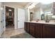 Double vanity bathroom with granite countertops at 27028 W Oraibi Dr, Buckeye, AZ 85396