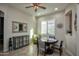 Dining area with round table, chairs, and decorative accents at 27028 W Oraibi Dr, Buckeye, AZ 85396