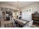 Bright dining area with a view into the kitchen at 27028 W Oraibi Dr, Buckeye, AZ 85396