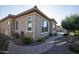 House exterior showcasing landscaping and walkway at 27028 W Oraibi Dr, Buckeye, AZ 85396