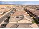 Aerial view of a new suburban neighborhood with numerous houses at 2929 E Birdsong Ave, San Tan Valley, AZ 85143