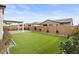 Artificial turf backyard with covered patio at 2929 E Birdsong Ave, San Tan Valley, AZ 85143