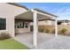 Covered patio and grassy backyard at 2929 E Birdsong Ave, San Tan Valley, AZ 85143