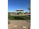 Community playground with play structures and shaded areas at 2929 E Birdsong Ave, San Tan Valley, AZ 85143