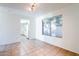 Bright dining area with tile floors and view of kitchen at 2929 E Broadway Rd # 13, Mesa, AZ 85204