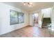 Dining area with access to a patio and stairs leading upstairs at 2929 E Broadway Rd # 13, Mesa, AZ 85204