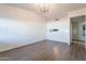 Living room with vaulted ceiling, wood-look floors, and neutral walls at 2929 E Broadway Rd # 13, Mesa, AZ 85204