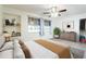 Main bedroom with wood-look floors and large windows at 2929 E Broadway Rd # 13, Mesa, AZ 85204