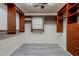 Spacious walk-in closet with custom built-in shelving and drawers at 2930 N 154Th Dr, Goodyear, AZ 85395