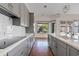 Modern eat-in kitchen with a large island and plenty of natural light through large windows at 3106 E Hiddenview Dr, Phoenix, AZ 85048