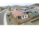 Aerial view showcasing a home's backyard oasis with a pool at 31817 N 124Th Dr, Peoria, AZ 85383