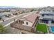 Aerial view showcasing a home's backyard oasis with a pool at 31817 N 124Th Dr, Peoria, AZ 85383