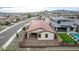 Aerial view showcasing a home's backyard oasis with a pool at 31817 N 124Th Dr, Peoria, AZ 85383