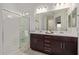 Bathroom boasts double vanity and large walk-in shower at 31817 N 124Th Dr, Peoria, AZ 85383