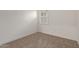 Well-lit bedroom featuring a window with shutters at 31817 N 124Th Dr, Peoria, AZ 85383