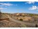 Landscaped walking path and neighborhood homes at 31817 N 124Th Dr, Peoria, AZ 85383