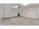 Spacious garage with overhead door and ample space at 31817 N 124Th Dr, Peoria, AZ 85383