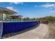 Modern pool with blue tile and walkway at 31817 N 124Th Dr, Peoria, AZ 85383