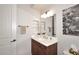 Clean bathroom with single sink and built-in shelving at 34457 N Legend Trail Pkwy # 2008, Scottsdale, AZ 85262