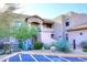 Attractive desert landscape enhances this condo's exterior elevation at 34457 N Legend Trail Pkwy # 2008, Scottsdale, AZ 85262