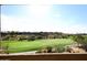 Stunning view of a lush green golf course with houses in the background at 34457 N Legend Trail Pkwy # 2008, Scottsdale, AZ 85262