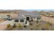 Aerial view of a single story house with landscaping at 3588 W New Life Ln, Queen Creek, AZ 85144