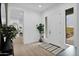 Bright and airy entryway with wood floors at 3588 W New Life Ln, Queen Creek, AZ 85144